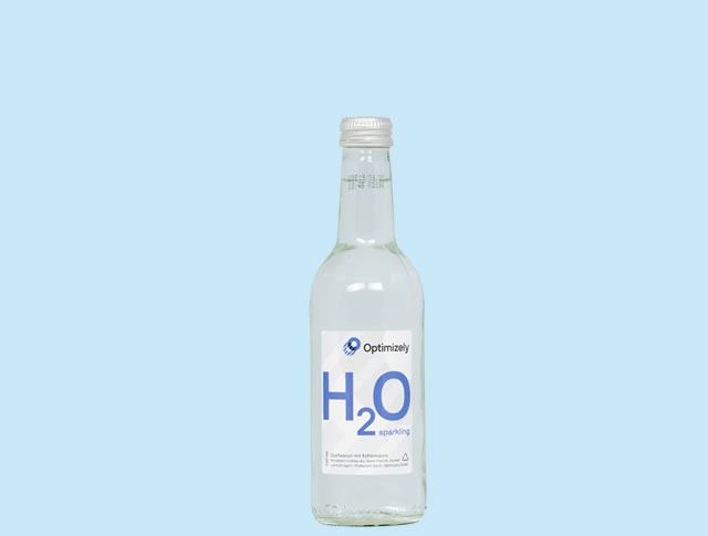 Kleine Glasflasche Wasser mit Logo 33 cl.